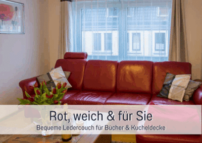 Fewos Bremerhaven Wohnung Rutenberg Wohnzimmer rotes Ledersofa